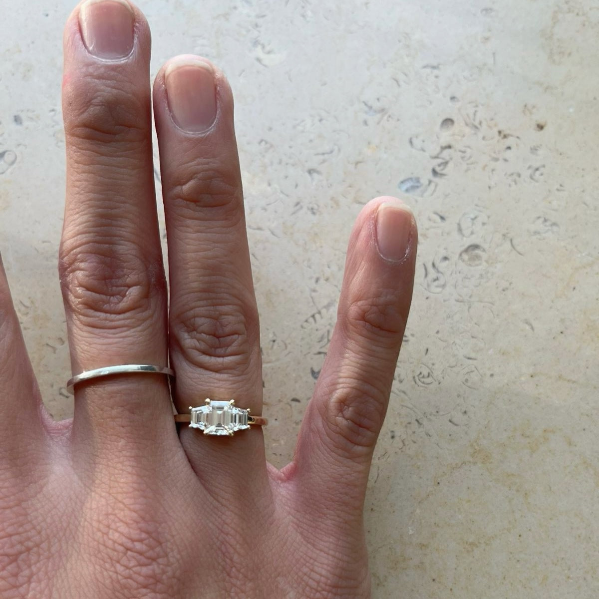 Emerald & Traps Engagement Ring