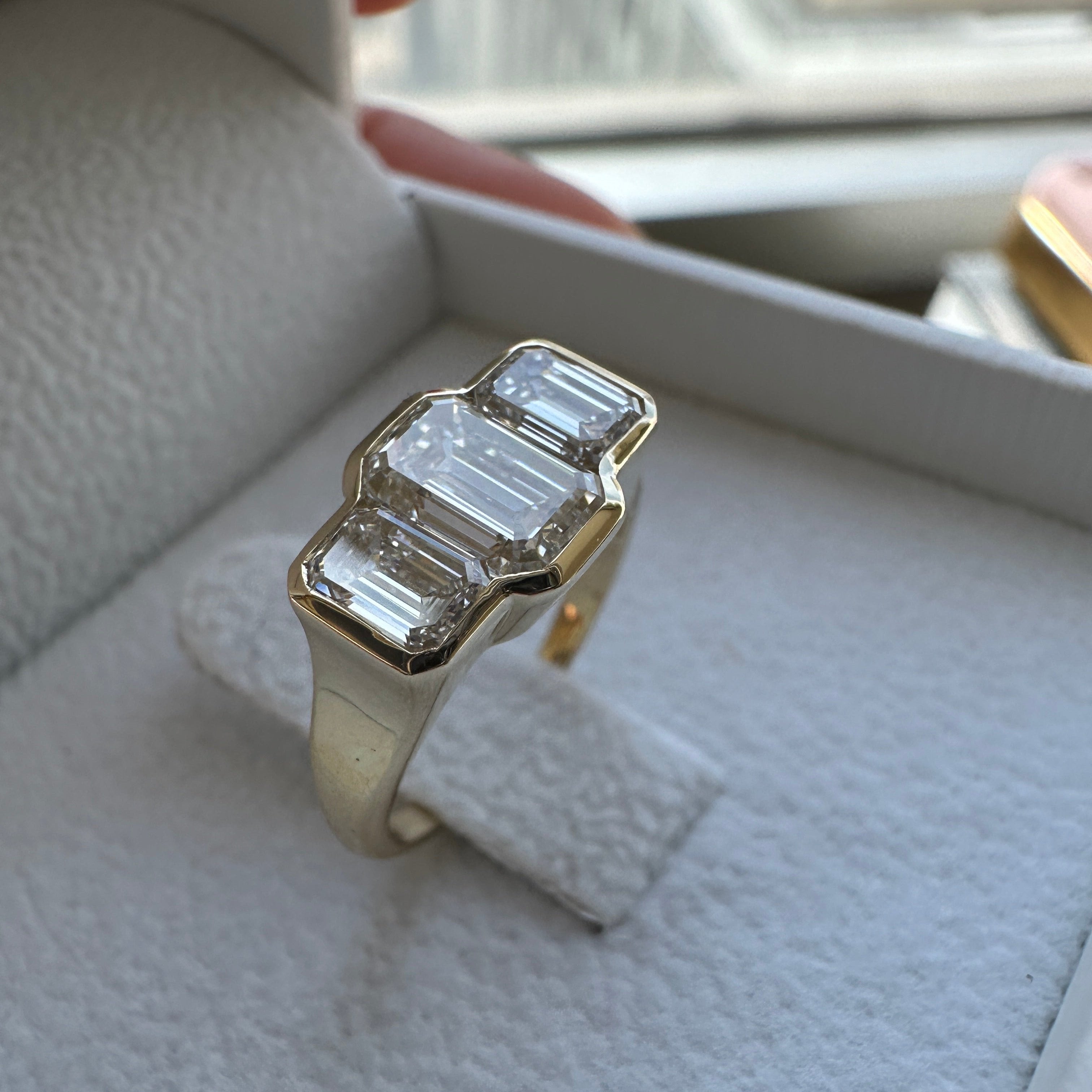 Three Stone Emerald Bezel | L