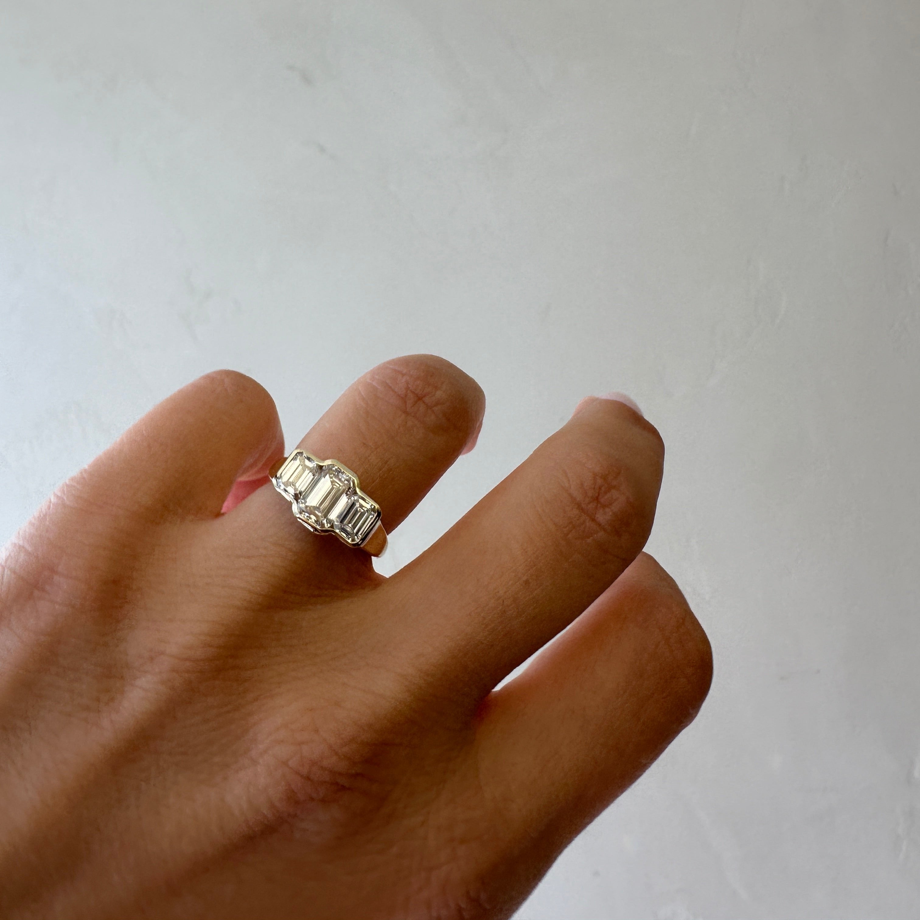 Three Stone Emerald Bezel | L