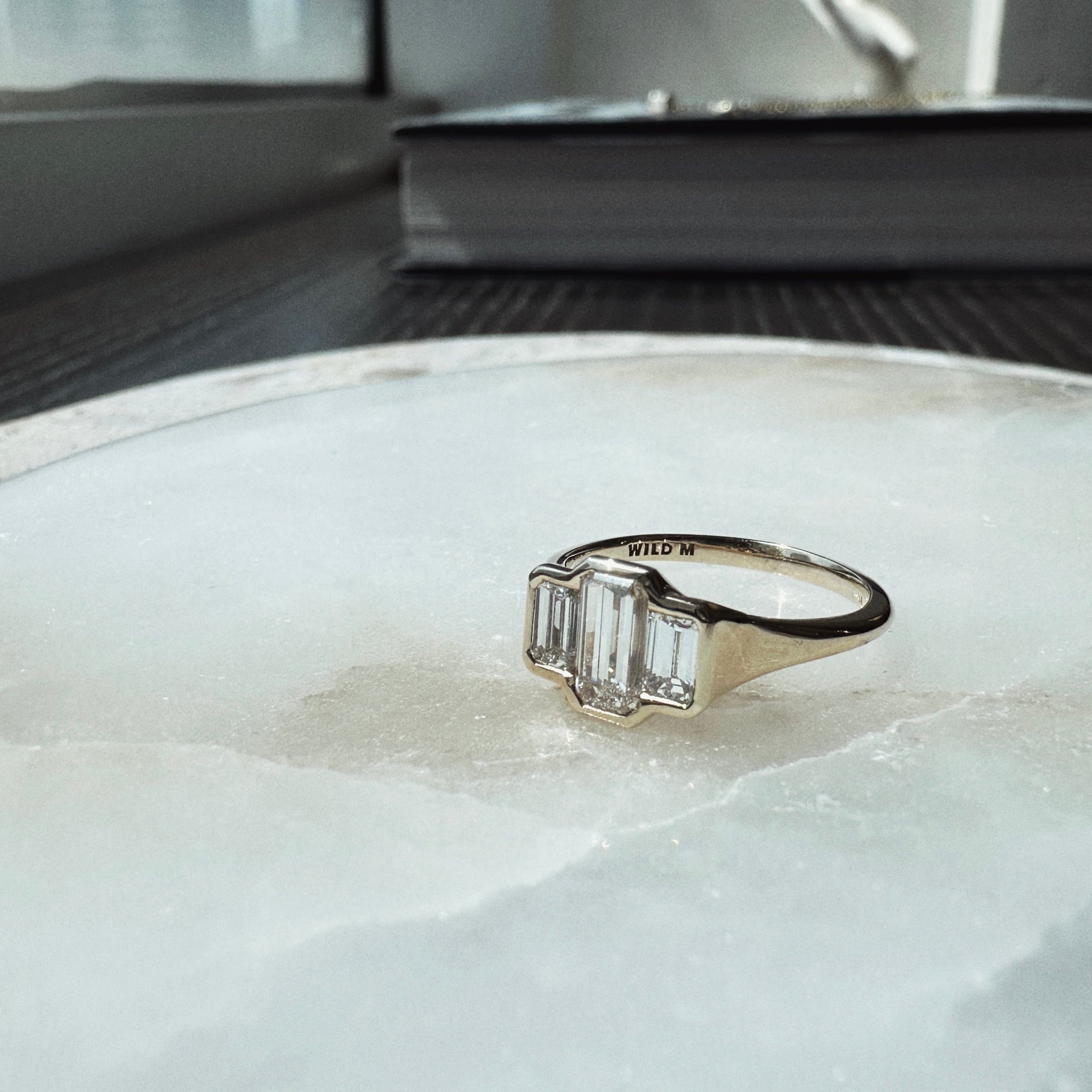 Three Stone Emerald Bezel | M