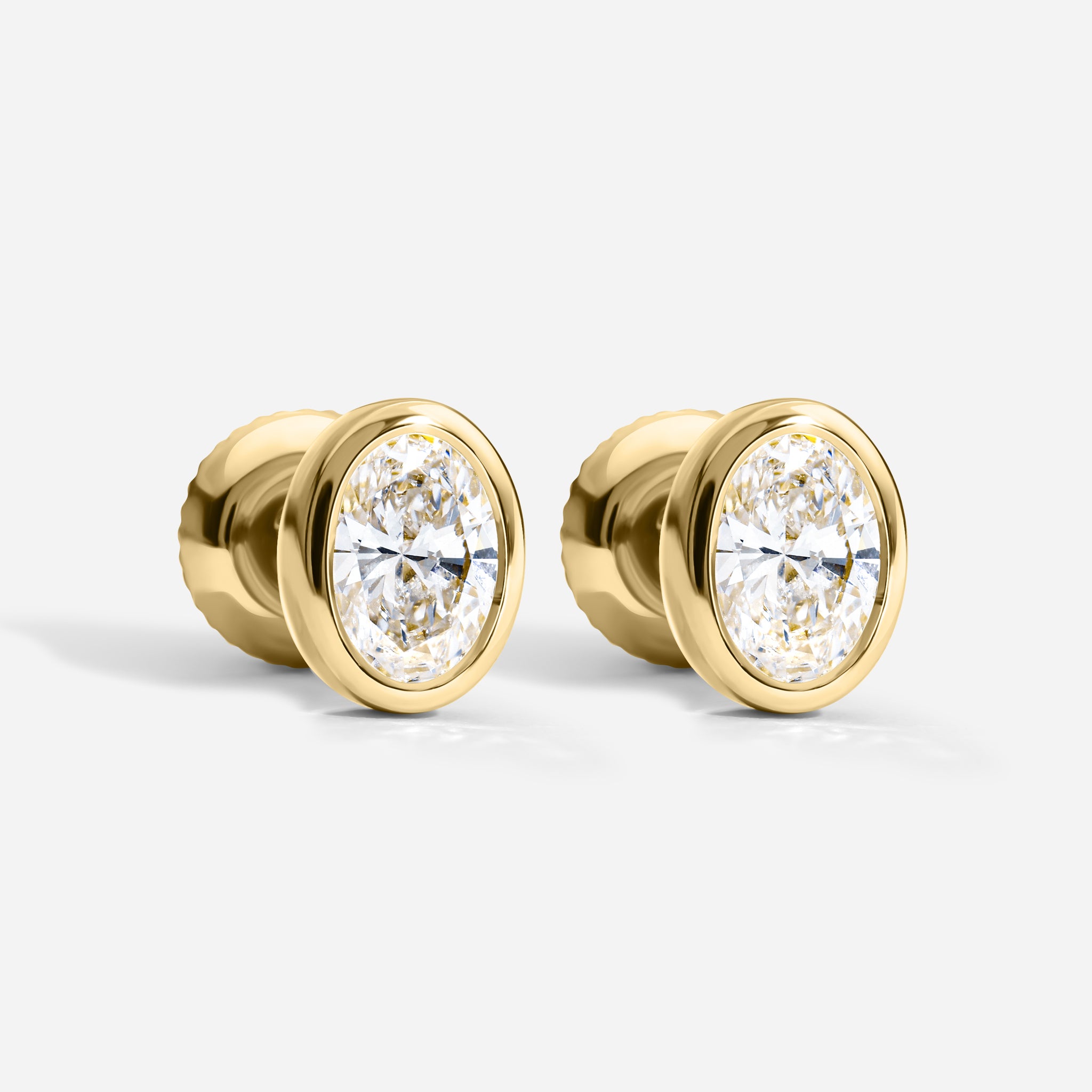 Oval Bezel Studs | 0.50 CT