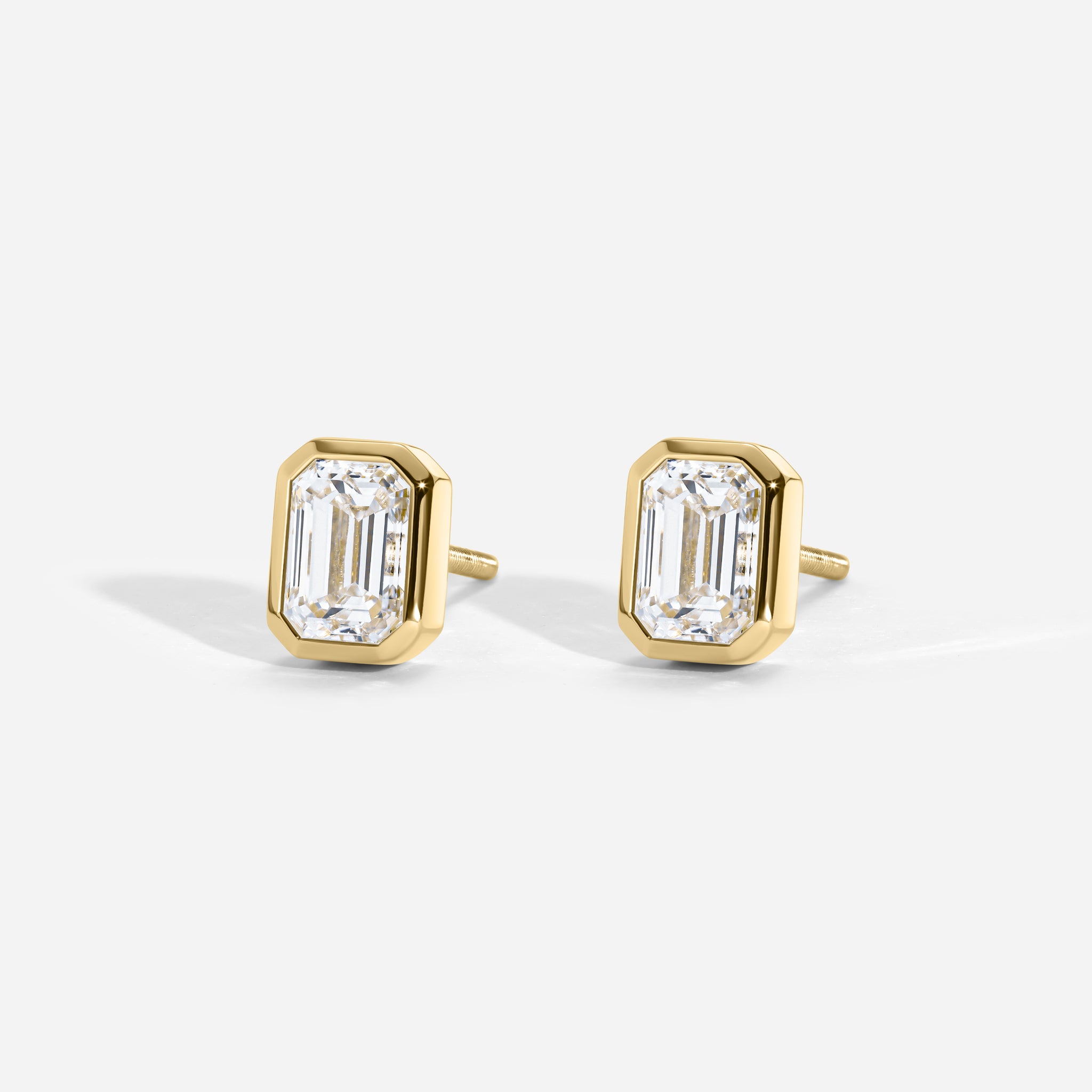 Emerald Bezel Studs